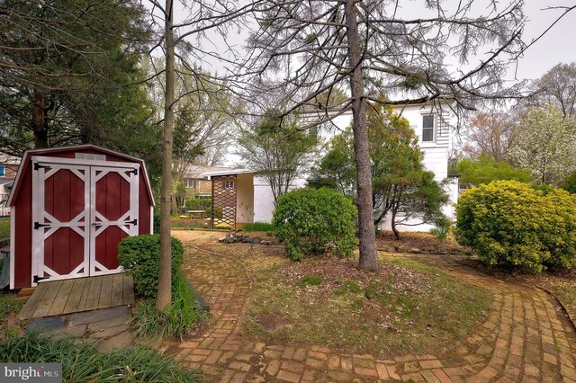 27 Ridge Rd, Greenbelt, MD 20770 - view of yard featuring a storage shed and an outdoor structure