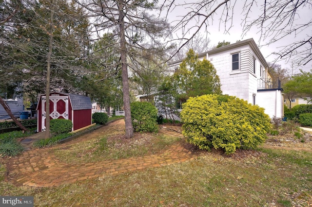 27 Ridge Rd, Greenbelt, MD 20770 - view of yard with an outdoor structure and a storage unit