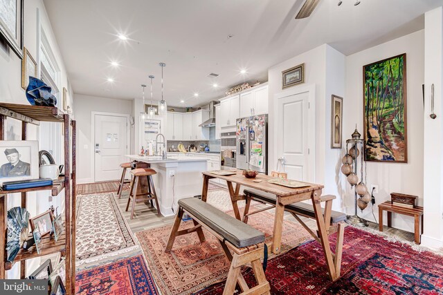104 Saint Ives Pl Unit 409, Oxon Hill, MD 20745 - dining space with light wood-type flooring, visible vents, and recessed lighting