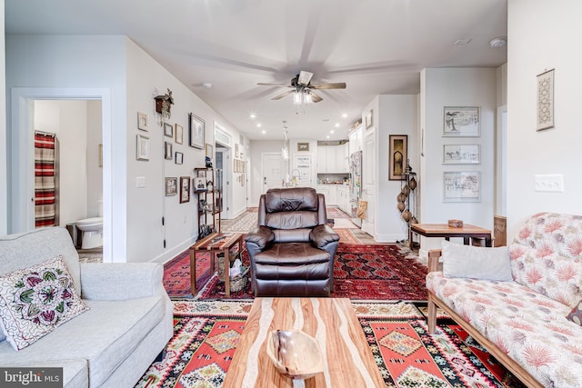 104 Saint Ives Pl Unit 409, Oxon Hill, MD 20745 - living room featuring ceiling fan, baseboards, and recessed lighting
