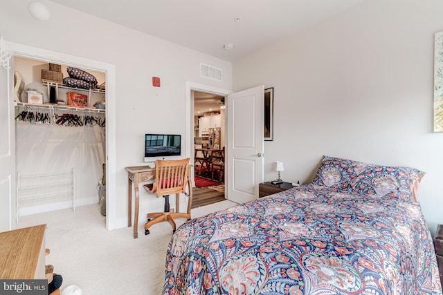 104 Saint Ives Pl Unit 409, Oxon Hill, MD 20745 - bedroom with a closet, carpet, and visible vents