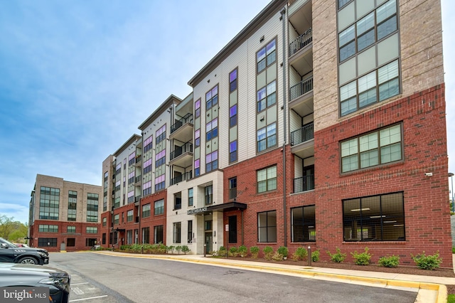 104 Saint Ives Pl Unit 409, Oxon Hill, MD 20745 - view of property with uncovered parking