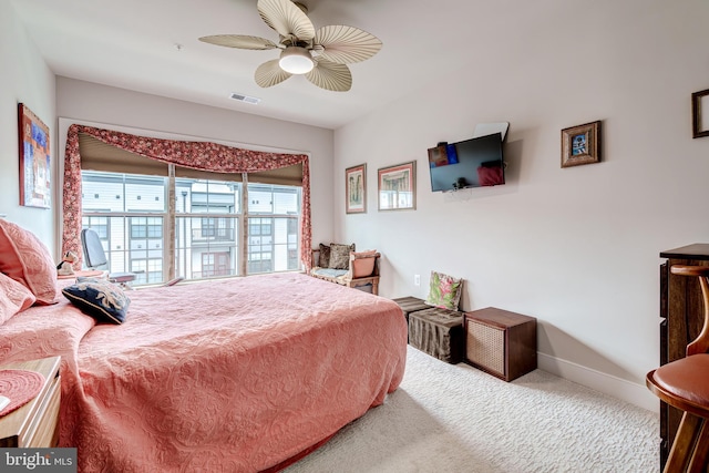 104 Saint Ives Pl Unit 409, Oxon Hill, MD 20745 - bedroom with ceiling fan, carpet flooring, baseboards, and visible vents