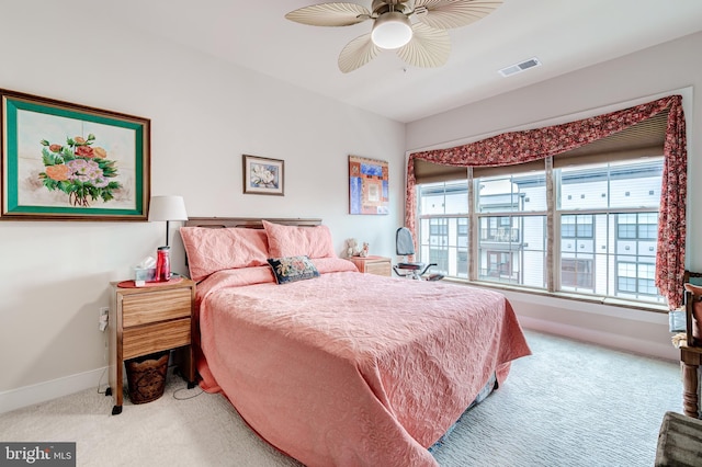 104 Saint Ives Pl Unit 409, Oxon Hill, MD 20745 - bedroom with visible vents, multiple windows, baseboards, and carpet floors