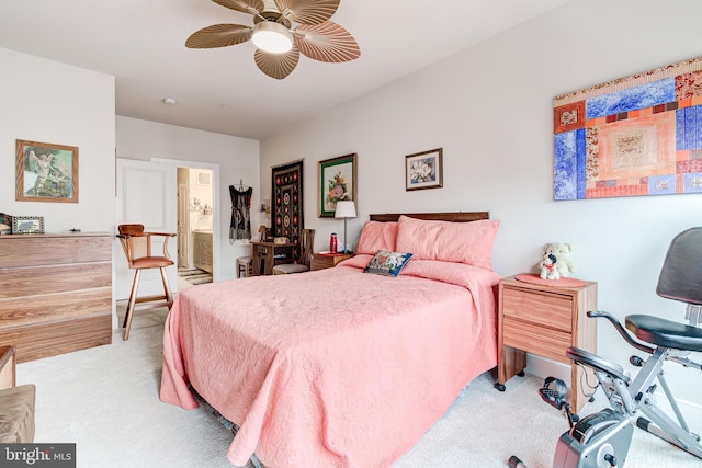 104 Saint Ives Pl Unit 409, Oxon Hill, MD 20745 - bedroom with light carpet, ceiling fan, and ensuite bath