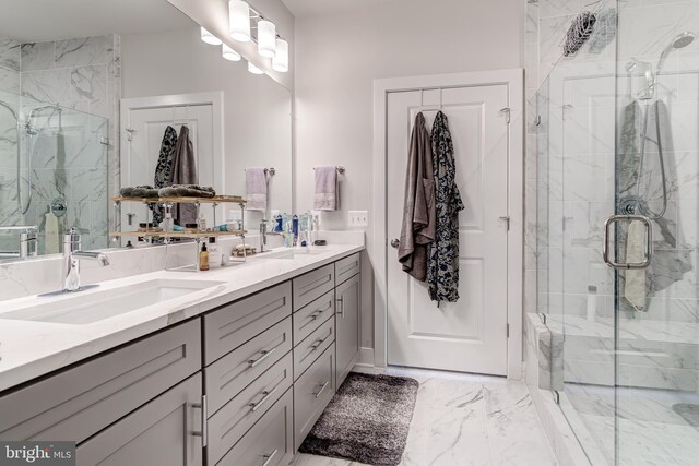 104 Saint Ives Pl Unit 409, Oxon Hill, MD 20745 - bathroom with marble finish floor, a sink, and a marble finish shower