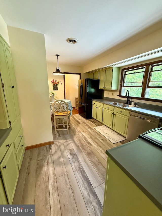 11003 Marty St NW, Lavale, MD 21502 - kitchen with a sink, green cabinets, freestanding refrigerator, dishwasher, and light wood finished floors