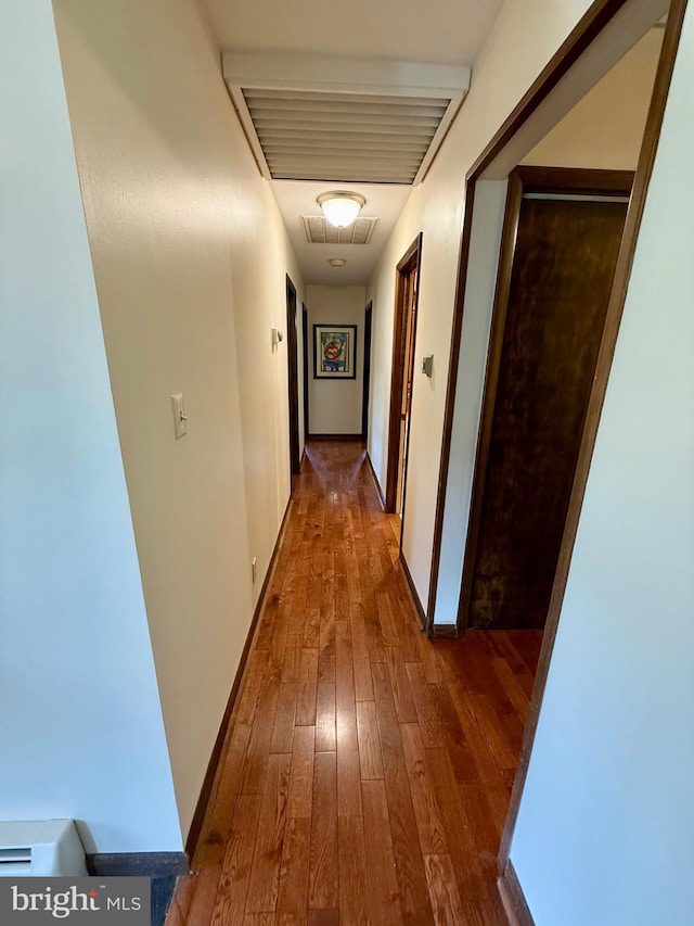 11003 Marty St NW, Lavale, MD 21502 - corridor with wood-type flooring, baseboards, and attic access