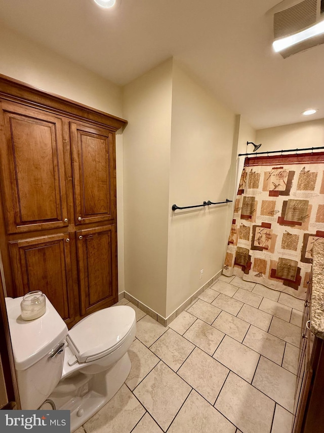 11003 Marty St NW, Lavale, MD 21502 - bathroom featuring toilet, a shower with shower curtain, tile patterned floors, and baseboards