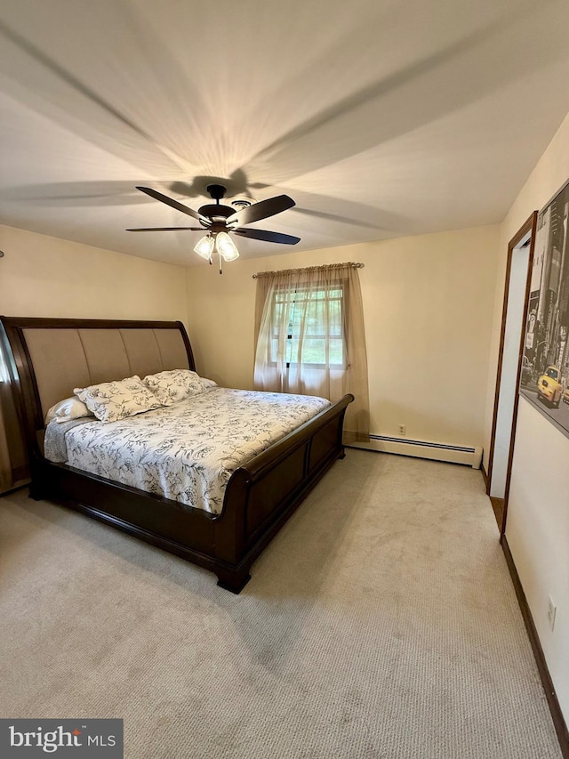11003 Marty St NW, Lavale, MD 21502 - bedroom featuring a baseboard radiator, light carpet, a ceiling fan, and baseboards