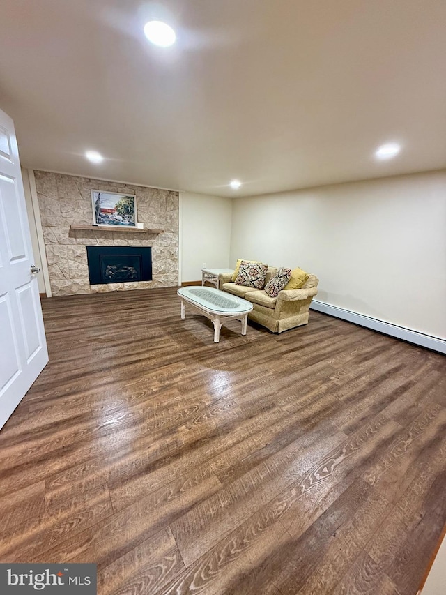 11003 Marty St NW, Lavale, MD 21502 - living room featuring a stone fireplace, wood finished floors, recessed lighting, and baseboards