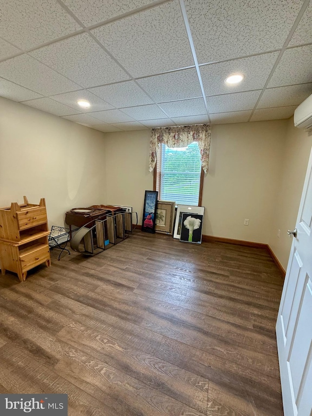 11003 Marty St NW, Lavale, MD 21502 - below grade area with a paneled ceiling, a wall mounted AC, wood finished floors, baseboards, and recessed lighting