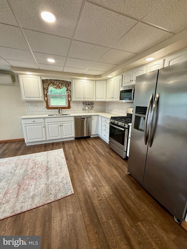11003 Marty St NW, Lavale, MD 21502 - kitchen featuring stainless steel appliances, white cabinets, light countertops, dark wood-style floors, and recessed lighting