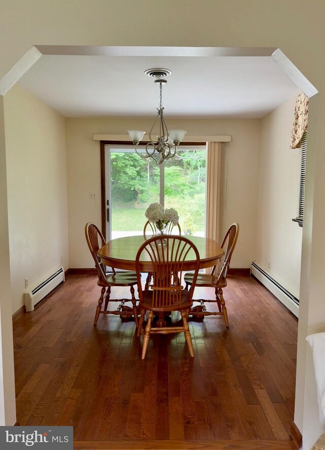 11003 Marty St NW, Lavale, MD 21502 - dining area with a baseboard heating unit, wood finished floors, a chandelier, and baseboards