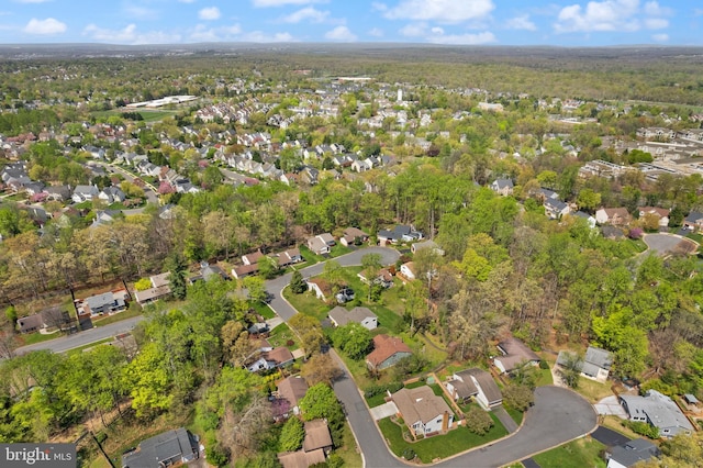 bird's eye view featuring a residential view and a view of trees
