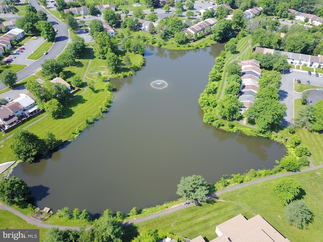 bird's eye view featuring a water view and a residential view