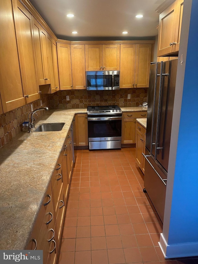 42 Rebecca Ct, Ewing, NJ 08628 - kitchen with light stone countertops, a sink, tile patterned floors, stainless steel appliances, and tasteful backsplash