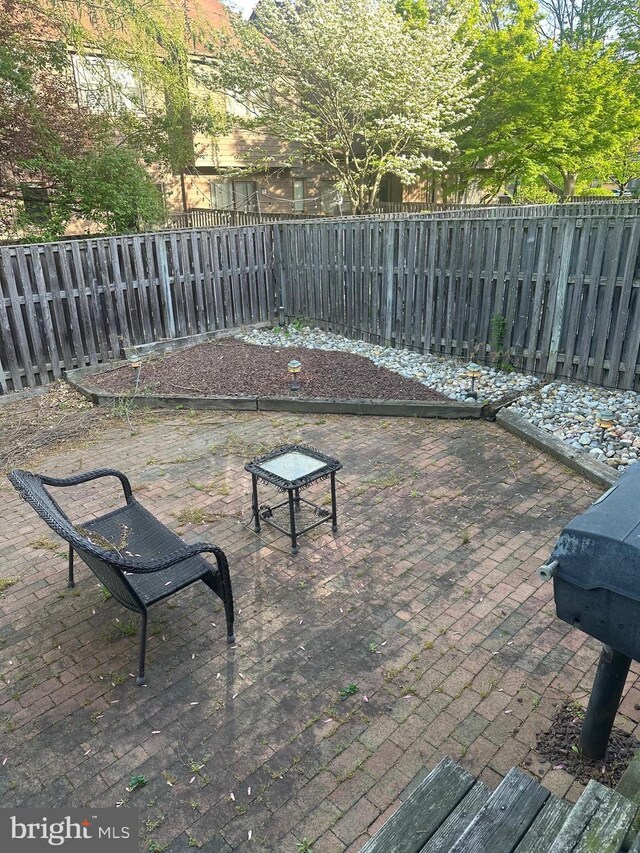 42 Rebecca Ct, Ewing, NJ 08628 - view of patio featuring a fenced backyard