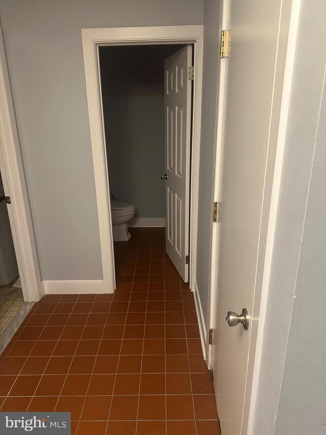 42 Rebecca Ct, Ewing, NJ 08628 - bathroom with baseboards, tile patterned floors, and toilet