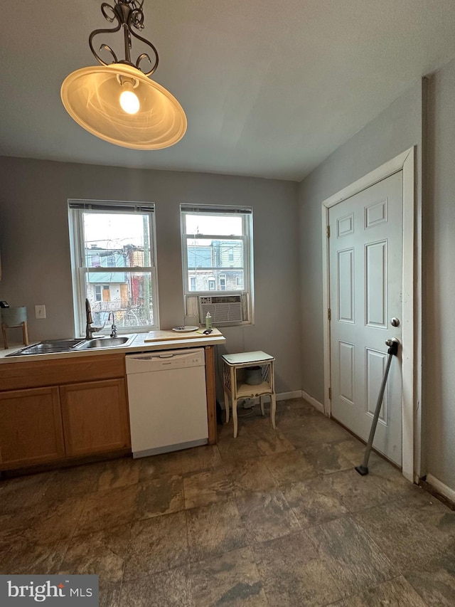 2261 Sidney Ave, Baltimore, MD 21230 - kitchen featuring baseboards, dishwasher, cooling unit, and a sink
