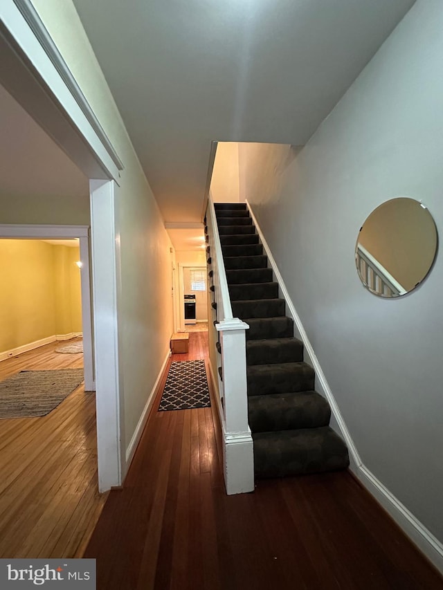 2261 Sidney Ave, Baltimore, MD 21230 - stairway featuring baseboards and hardwood / wood-style floors