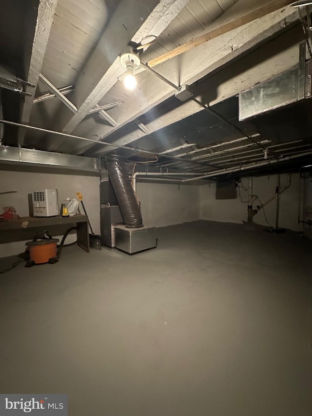 2261 Sidney Ave, Baltimore, MD 21230 - unfinished basement featuring heating unit