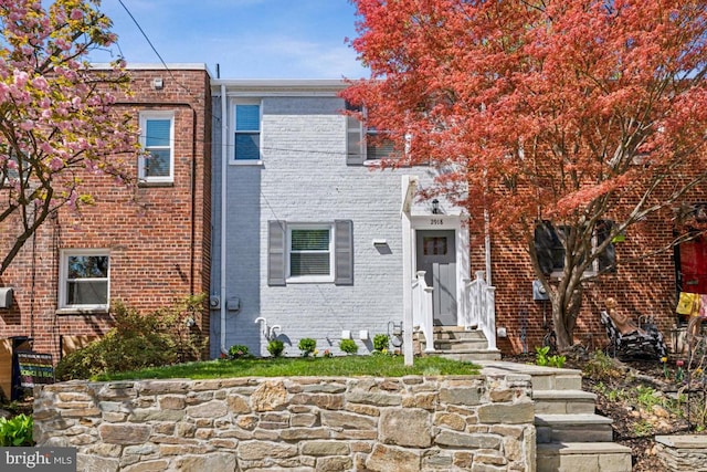 2918 Landover St, Alexandria, VA 22305 - townhome / multi-family property featuring brick siding and entry steps