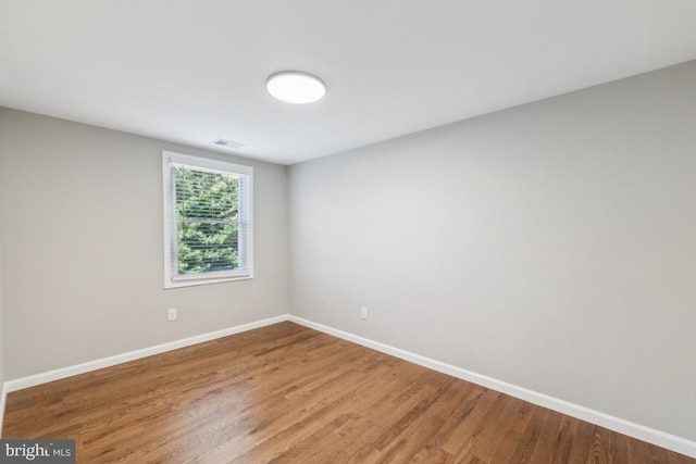 2918 Landover St, Alexandria, VA 22305 - unfurnished room featuring baseboards, wood finished floors, and visible vents