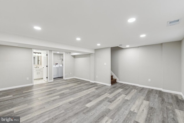 2918 Landover St, Alexandria, VA 22305 - finished basement with wood finished floors, recessed lighting, stairway, and washer / dryer