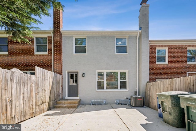 2918 Landover St, Alexandria, VA 22305 - rear view of house with a chimney, fence, a patio area, and cooling unit