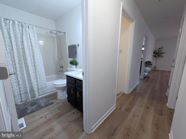 1505 Cedarcrest Ln, Frederick, MD 21702 - bathroom featuring shower / bath combination with curtain, wood finished floors, toilet, and vanity