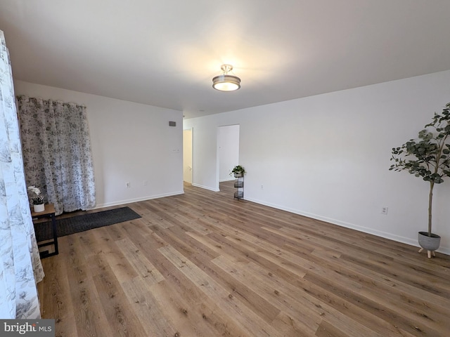 1505 Cedarcrest Ln, Frederick, MD 21702 - empty room with wood finished floors and baseboards