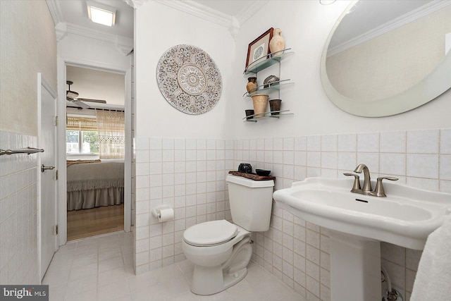 1506 N Bay Shore Dr, Milton, DE 19968 - half bathroom featuring tile patterned flooring, tile walls, and crown molding