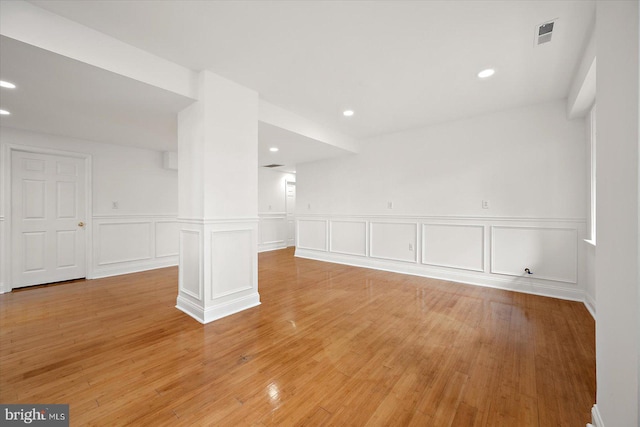 1506 N Bay Shore Dr, Milton, DE 19968 - basement featuring light wood finished floors, visible vents, and recessed lighting