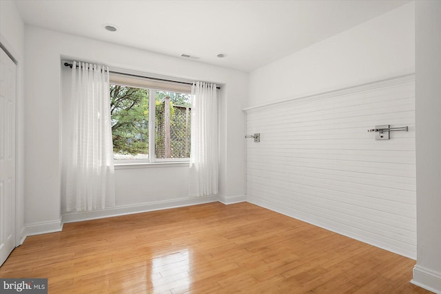 1506 N Bay Shore Dr, Milton, DE 19968 - empty room featuring light wood finished floors, baseboards, and visible vents