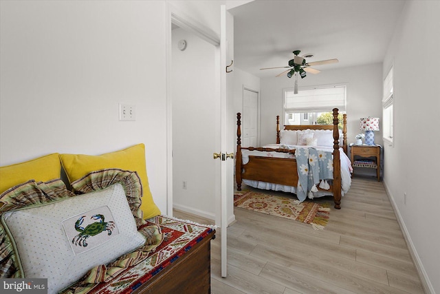 1506 N Bay Shore Dr, Milton, DE 19968 - bedroom with light wood-type flooring, baseboards, and a ceiling fan