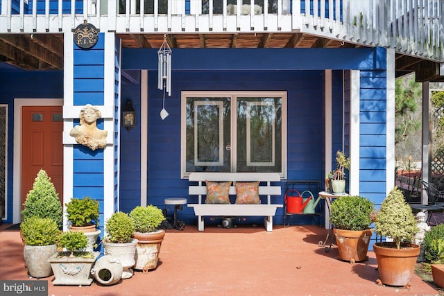 1506 N Bay Shore Dr, Milton, DE 19968 - view of exterior entry featuring covered porch