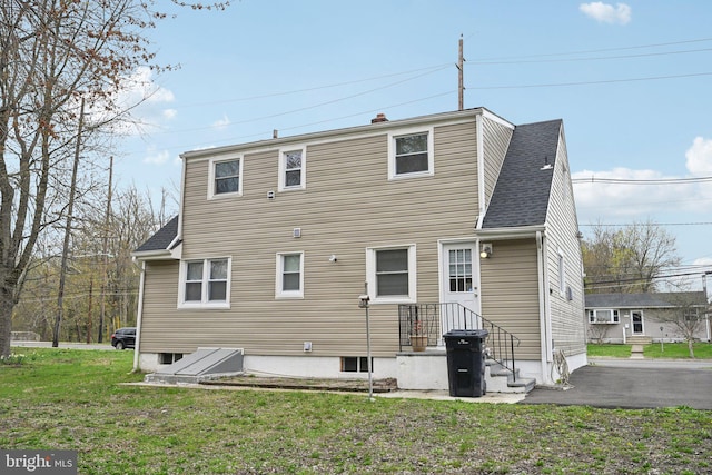 2175 Princeton Pike, Lawrenceville, NJ 08648 - back of property with roof with shingles and a lawn