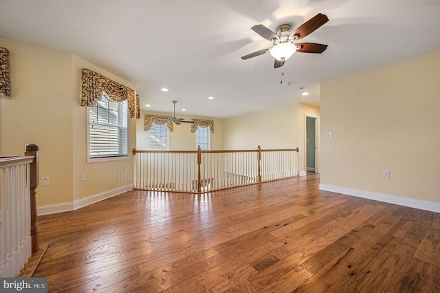 105 Arch St, Milton, DE 19968 - unfurnished room with wood-type flooring, a ceiling fan, baseboards, and recessed lighting