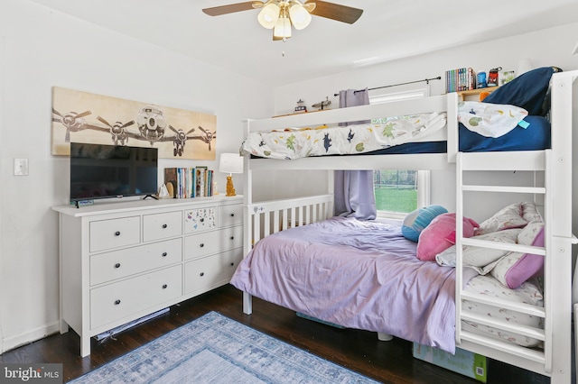 bedroom featuring wood finished floors and ceiling fan