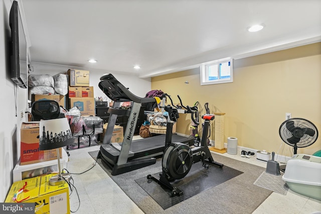 workout area featuring recessed lighting