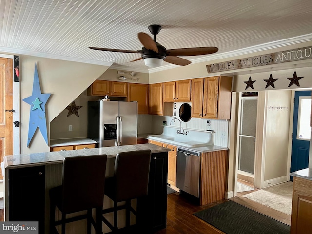 1671 Fravel Rd, Woodstock, VA 22664 - kitchen featuring stainless steel appliances, ceiling fan, light countertops, crown molding, and a sink
