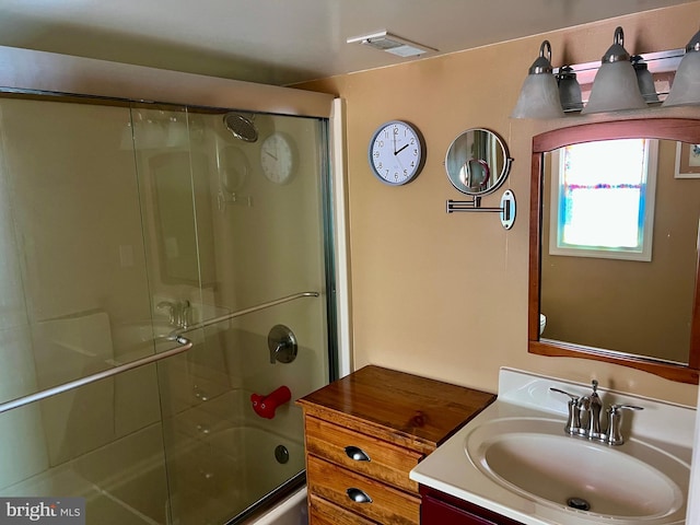 1671 Fravel Rd, Woodstock, VA 22664 - bathroom featuring vanity and combined bath / shower with glass door