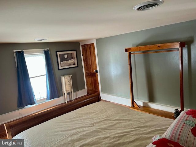 1671 Fravel Rd, Woodstock, VA 22664 - bedroom featuring wood finished floors and baseboards