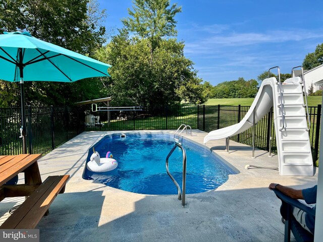 1671 Fravel Rd, Woodstock, VA 22664 - view of pool featuring a water slide, fence, and a patio area