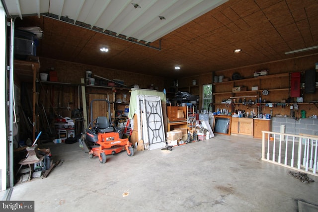 1671 Fravel Rd, Woodstock, VA 22664 - garage featuring a workshop area and recessed lighting