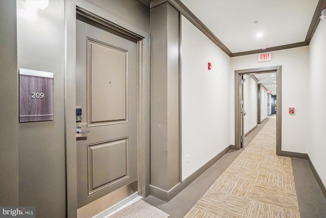 102 Saint Ives Pl Unit 209, National Harbor, MD 20745 - hallway featuring crown molding, recessed lighting, baseboards, and carpet floors