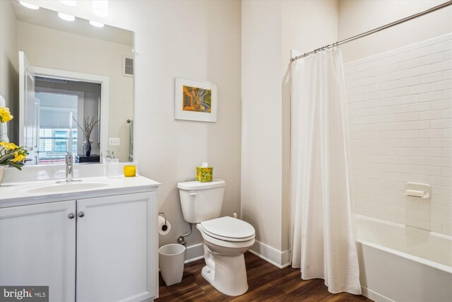 102 Saint Ives Pl Unit 209, National Harbor, MD 20745 - full bath with vanity, baseboards, toilet, visible vents, and wood finished floors