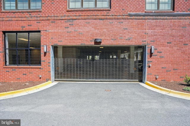 102 Saint Ives Pl Unit 209, National Harbor, MD 20745 - doorway to property with brick siding