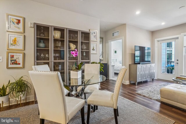 102 Saint Ives Pl Unit 209, National Harbor, MD 20745 - dining room featuring wood finished floors, baseboards, visible vents, and recessed lighting